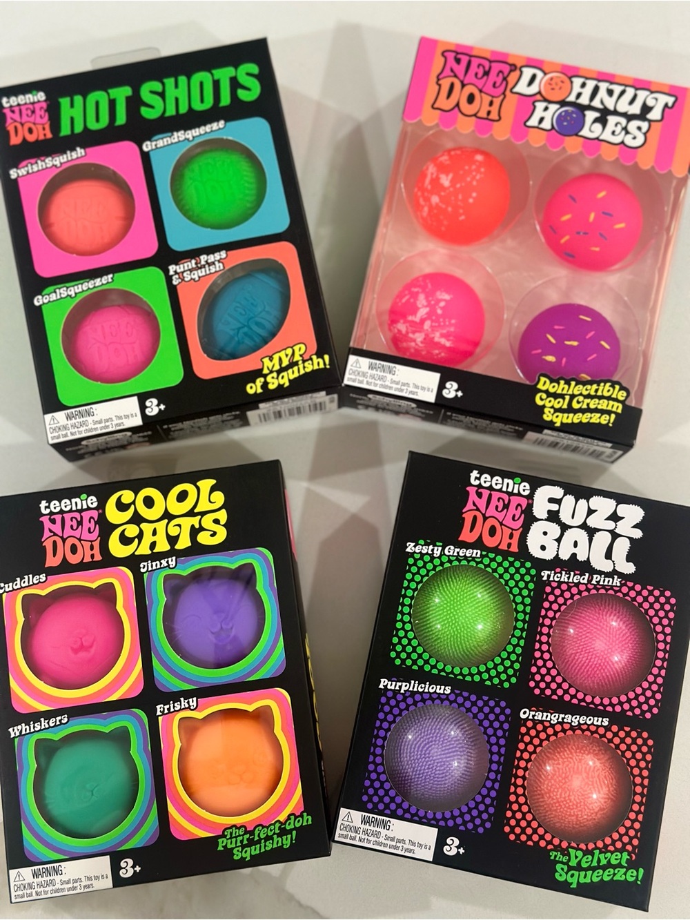 Teenie NeeDoh Set of 4 - four packs ; cool cats, hot shots, Fuzzball, donut
